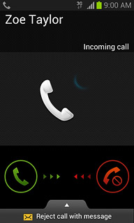 When you have an ongoing call, the new call is signalled by a sound.Press and drag the accept call icon right.