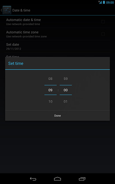 Slide hours and minutes up or down to set the time.