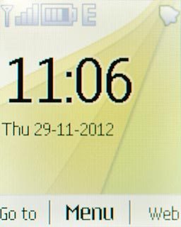 The alarm icon shows that the alarm is set.Further information:Set the alarm