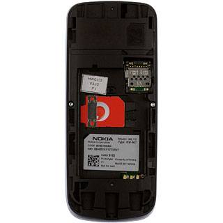 Turn the memory card as illustrated on the memory card holder.Slide the memory card into the memory card holder.