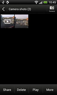 Go to the required folder.Press the required picture or the required video clip.