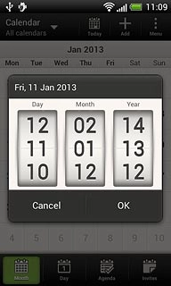 Press and drag day, month and year up or down to select the required date.