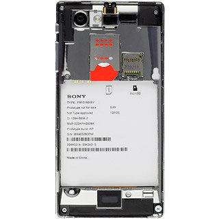 Turn the memory card as illustrated next to the memory card holder.
