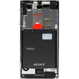 Take hold of the bottom left of the battery and remove it.