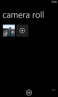 Go to the required folder.Press the required picture or the required video clip.