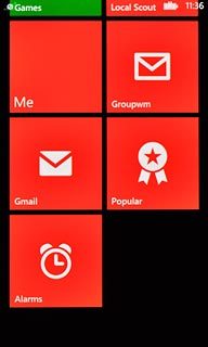 Press and hold the required shortcut until the shortcut is enlarged.To move a shortcut:Drag the shortcut to the required position.