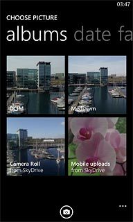 To take a new picture:Press the camera icon.