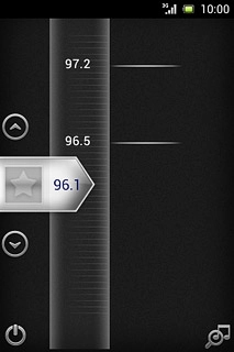 The radio searches for channels and the channels found are displayed on the dial.