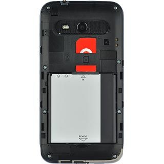 Place the battery in your phone, top first, matching the battery contacts with the phone contacts and press the battery into place.
