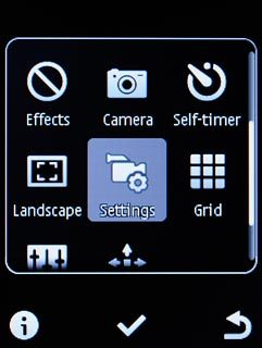 Scroll to Settings and press the Navigation key.