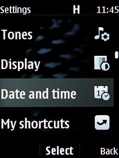 Scroll to Date and time and press the Navigation key.