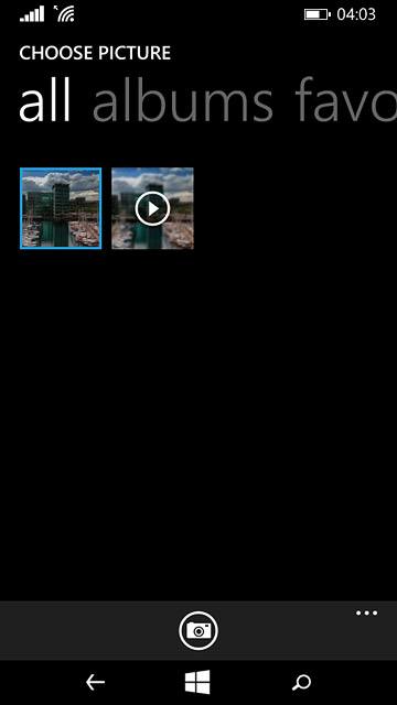 To take a new picture:Press the camera icon.