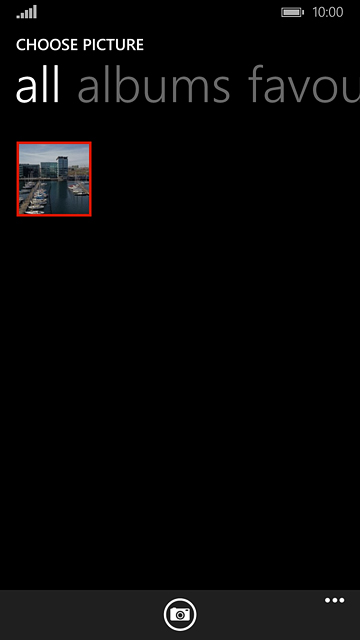 To take a new picture:Press the camera icon.