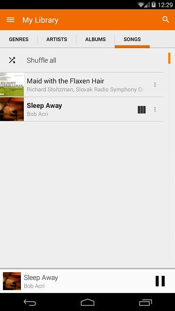 Press the album cover at the bottom the display.