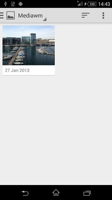 Go to the required folder.Press the required picture.